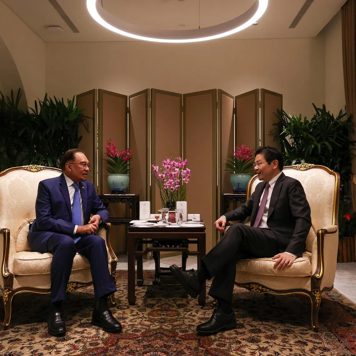 Prime Minister Lawrence Wong hosting Malaysia's Prime Minister Anwar Ibrahim to tea at the Istana on May 31.
