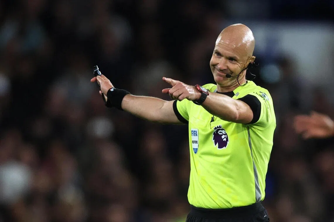 Referee Anthony Taylor during a Premier League match between Chelsea and Liverpool.