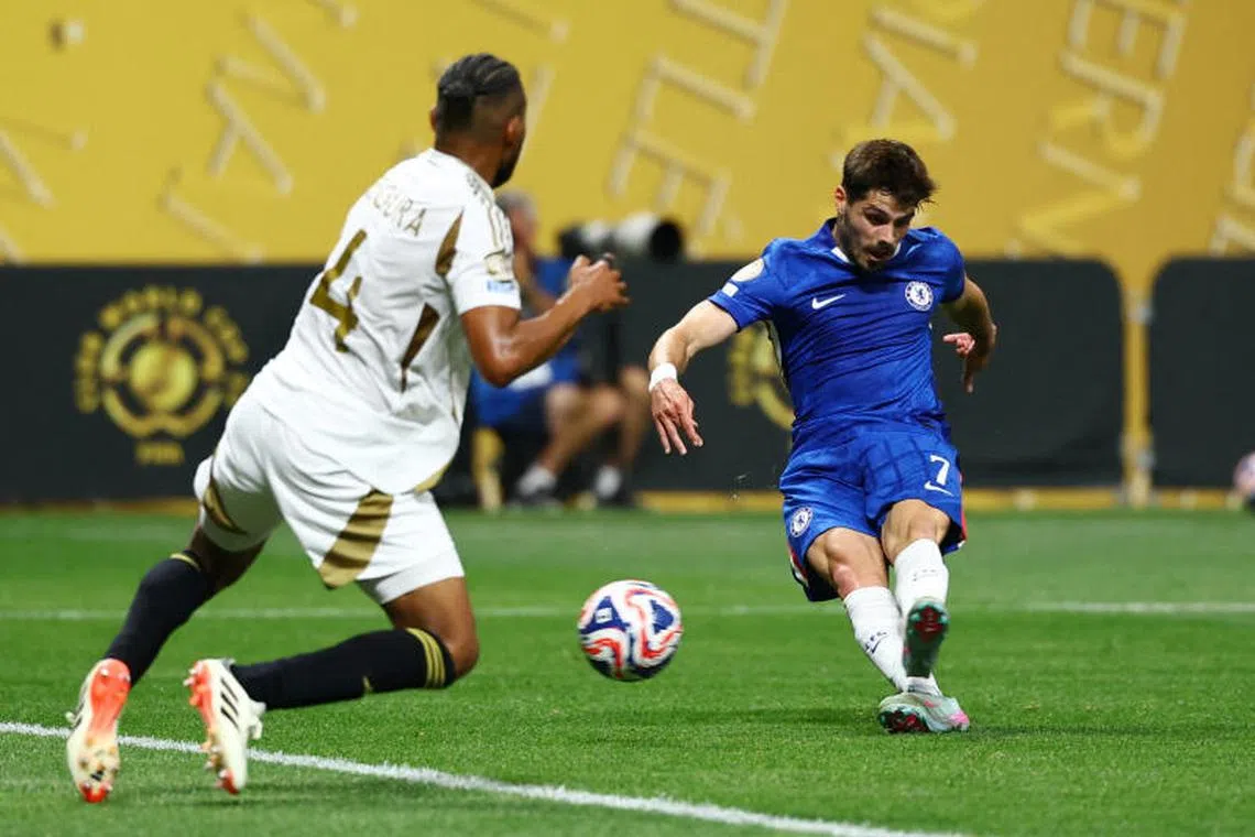 Chelsea's Pedro Neto scores their first goal.