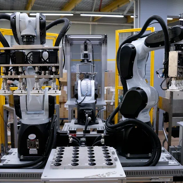 An AI-powered vision system, co-developed by Sunningdale Tech and A*Star, inspects components on the factory floor.