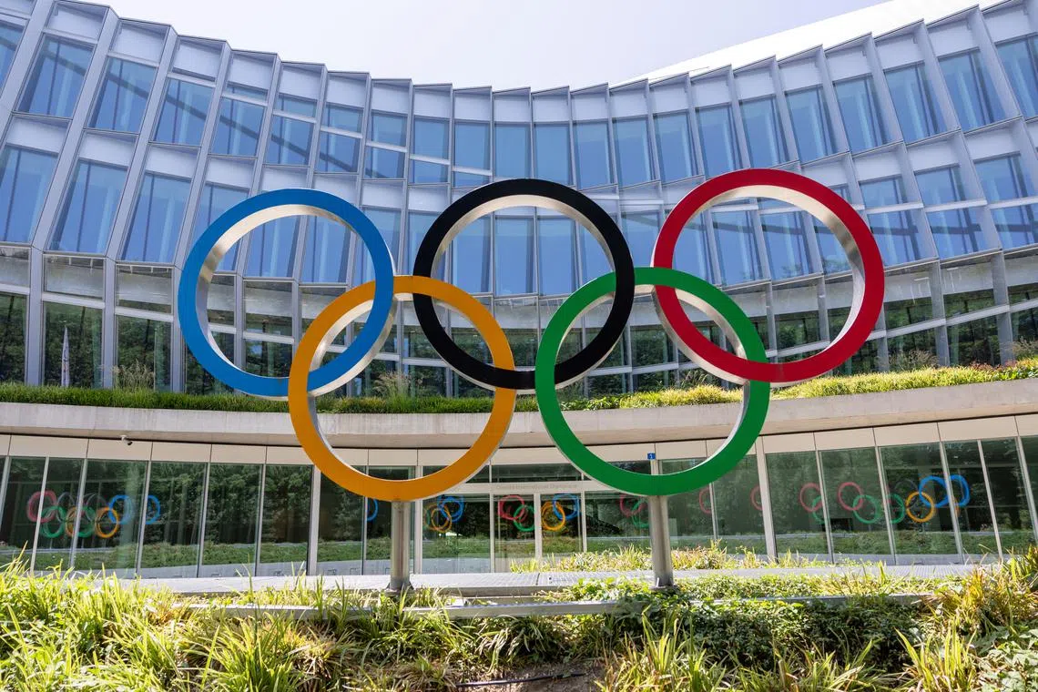 FILE PHOTO: Olympic rings are pictured outside the International Olympic Committee (IOC) ahead of newly elected President Kirsty Coventry first Executive Board meeting at the Olympic House in Lausanne, Switzerland, June 25, 2025. REUTERS/Denis Balibouse/File Photo