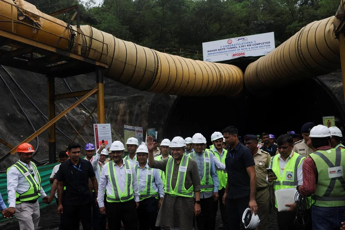 Ashwini Vaishnaw, Union Minister of Railways of India waves to media outside a tunnel completed as part of the Mumbai–Ahmedabad bullet train project in Navi Mumbai, India, September 20, 2025. REUTERS/Francis Mascarenhas