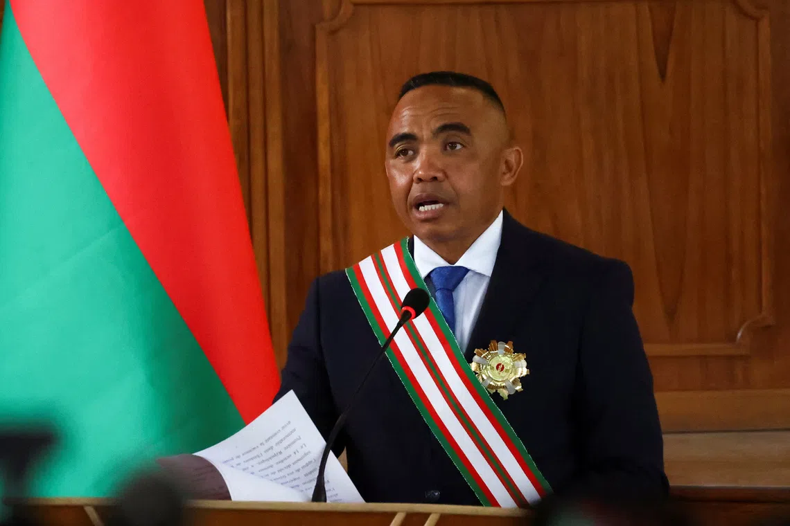 Madagascar's new military ruler, Colonel Michael Randrianirina, speaks after being sworn in as president on Friday taking over from Andry Rajoelina following a coup that ousted him, at the constitutional court in Antanariv , Madagascar, October 17, 2025. REUTERS/Siphiwe Sibeko