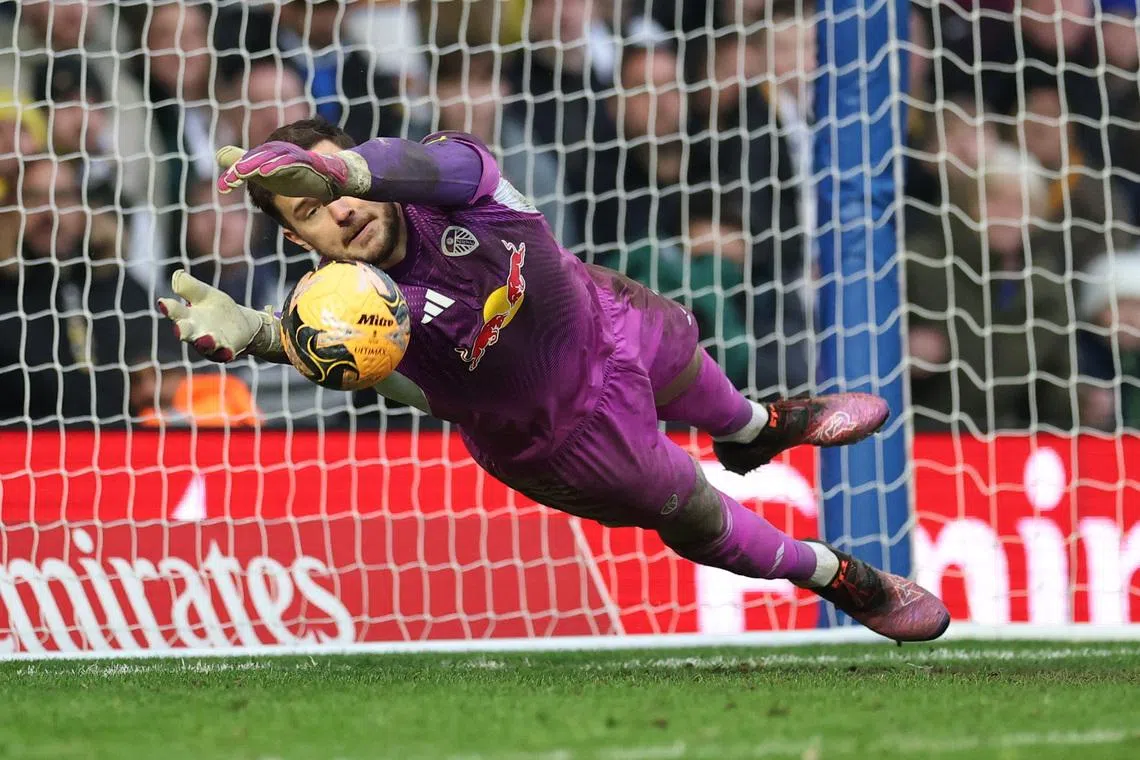 Soccer Football -  FA Cup - Fourth Round - Birmingham City v Leeds United - St Andrew's @ Knighthead Park, Birmingham, Britain - February 15, 2026 Leeds United's Lucas Perri saves a penalty during the penalty shootout Action Images via Reuters/Andrew Boyers