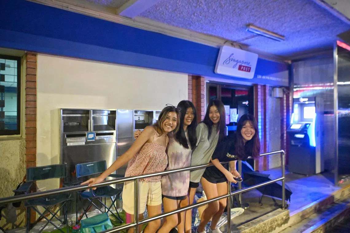 Former secondary school friends, (from left) Nellie Titus, 18, Rebekah Loh, 18, Megan Choy, 18 and Lynette Saw, 18, at the Lim Ah Pin Post Office on July 5, 2023. ST PHOTO: Ariffin Jamar