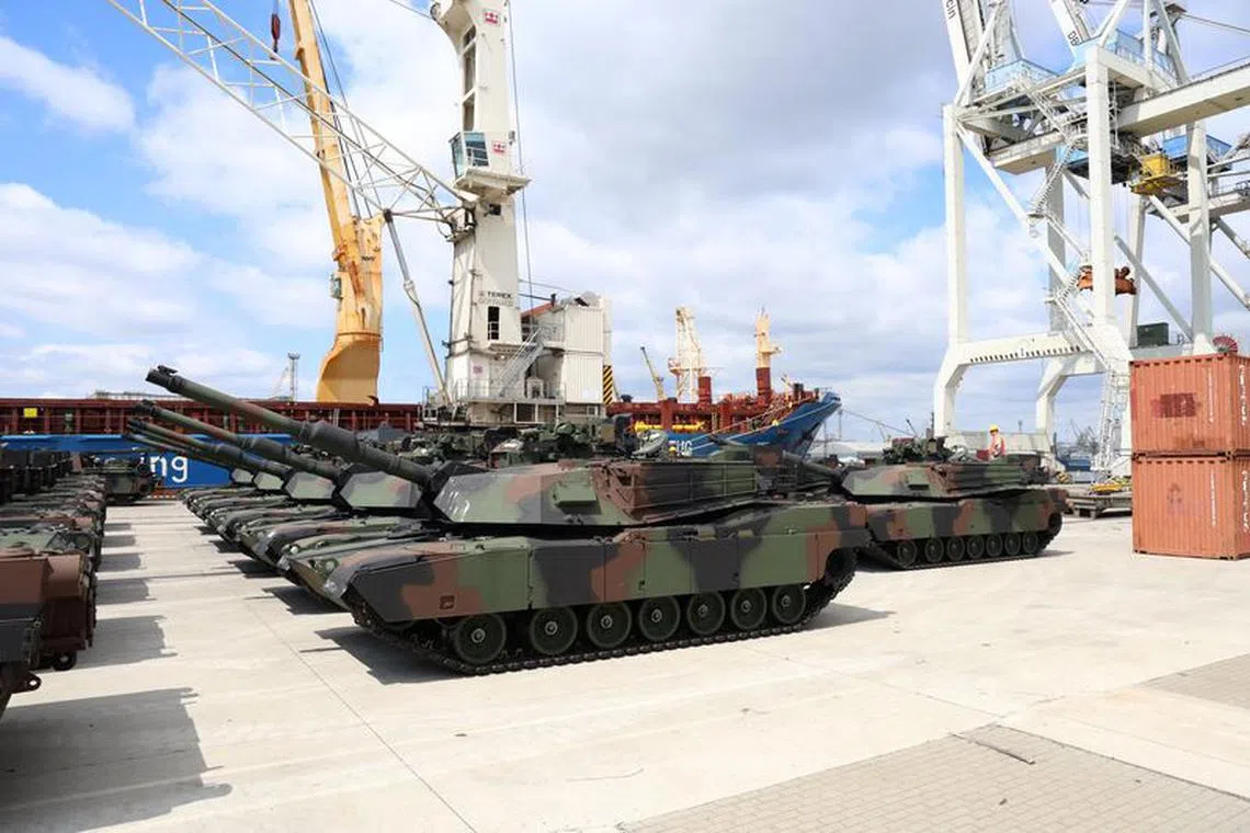 General view of the delivery of the first company of U.S.-made Abrams M1A1 tanks to arrive in the country under a deal finalised in 2022, at the port in Szczecin, Poland, June 28, 2023. Cezary Aszkielowicz/ Agencja Wyborcza.pl via REUTERS/ File Photo