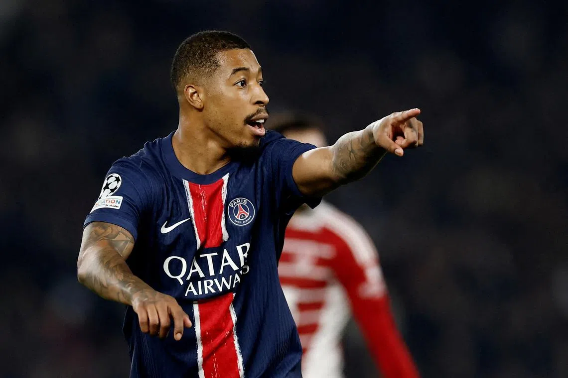 FILE PHOTO: Soccer Football - Champions League - Knockout Phase Playoff - Second Leg - Paris St Germain v Brest - Parc des Princes, Paris, France - February 19, 2025 Paris St Germain's Presnel Kimpembe reacts REUTERS/Christian Hartmann/File Photo