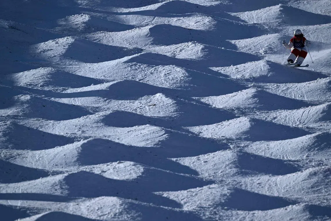 Canada's Ashley Koehler competing in the freestyle skiing women's final  during the Milano Cortina 2026 Winter Olympic Games at Livigno Aerials & Moguls Park, in Livigno, Italy on Feb 11, 2026. 