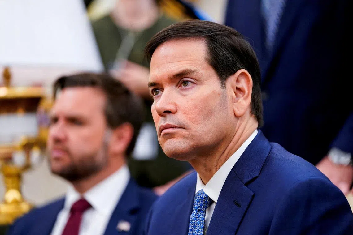 FILE PHOTO: U.S. Secretary of State Marco Rubio takes part in a meeting between President Donald Trump and NATO Secretary General Mark Rutte in the Oval Office at the White House in Washington, D.C., U.S., July 14, 2025. REUTERS/Nathan Howard/File Photo