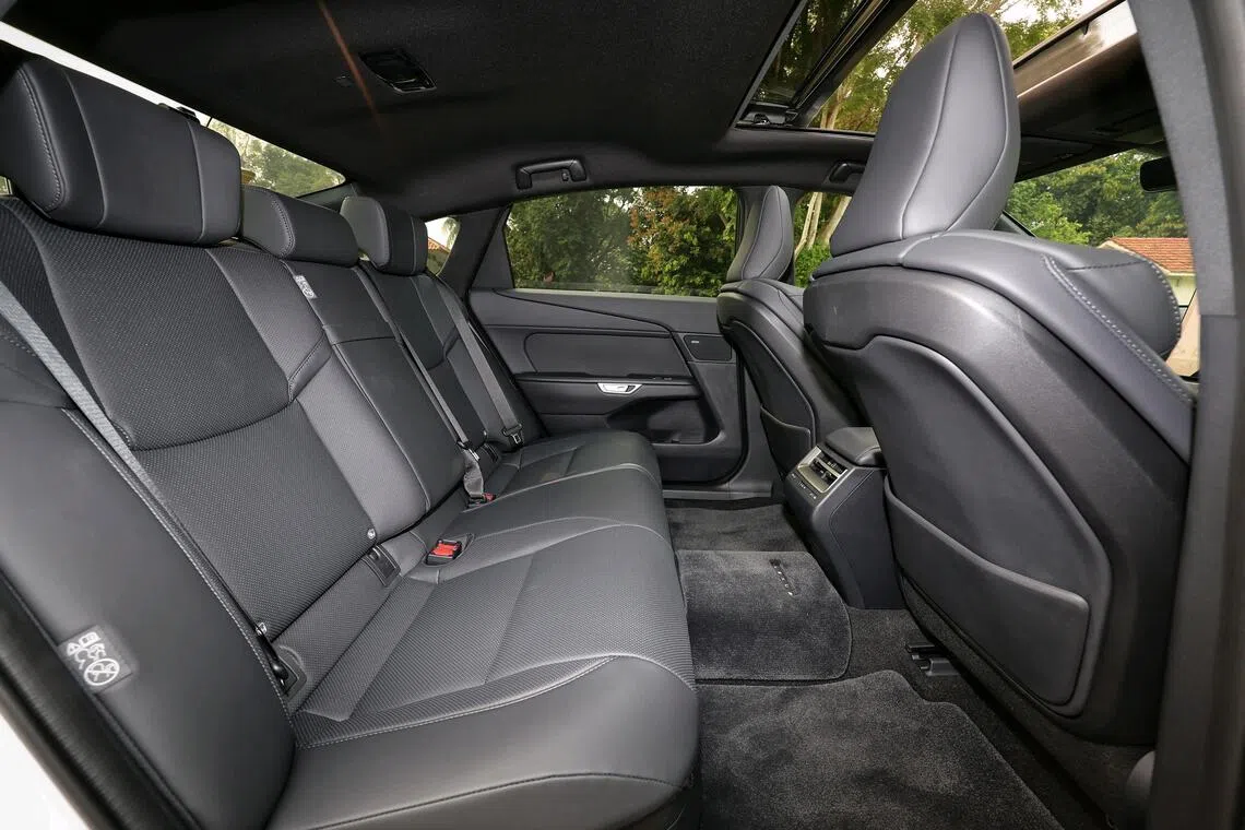 The hybrid ES has slightly more room in the second row than its electric twin.