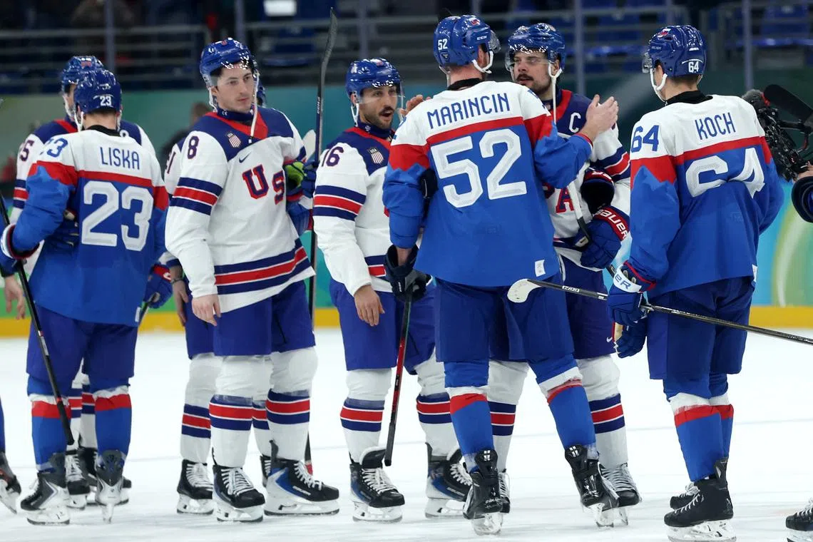 Milano Cortina 2026 Olympics - Ice Hockey - Men's Play-offs Semifinals - United States vs Slovakia - Milano Santagiulia Ice Hockey Arena, Milan, Italy - February 20, 2026. Auston Matthews of United States with Martin Marincin of Slovakia after the match REUTERS/Mike Segar