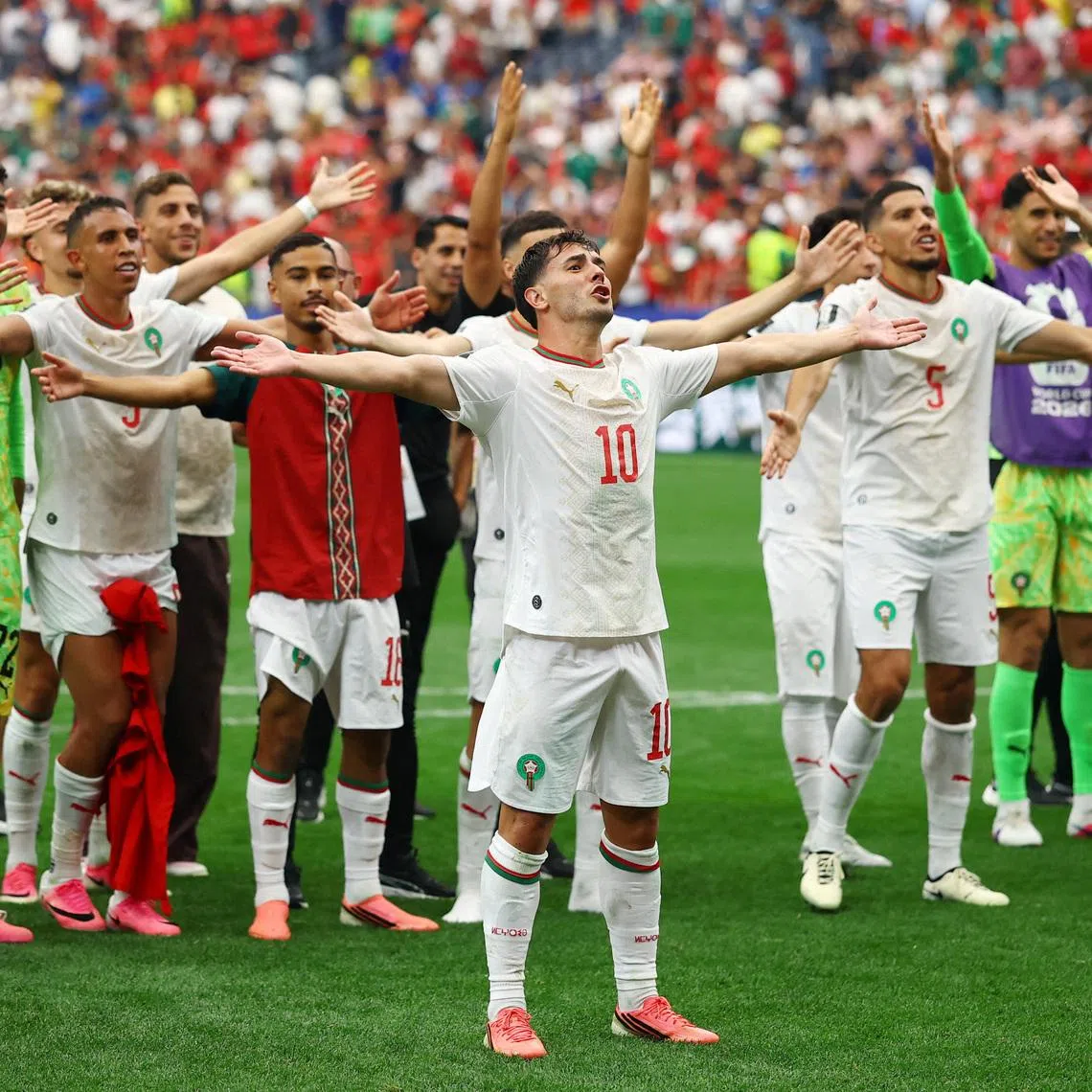 Soccer Football - FIFA World Cup 2026 - Round of 16 - Canada v Morocco - Houston Stadium, Houston, Texas, U.S. - July 4, 2026 Morocco's Brahim Diaz and teammates celebrate after the match REUTERS/Hannah Mckay