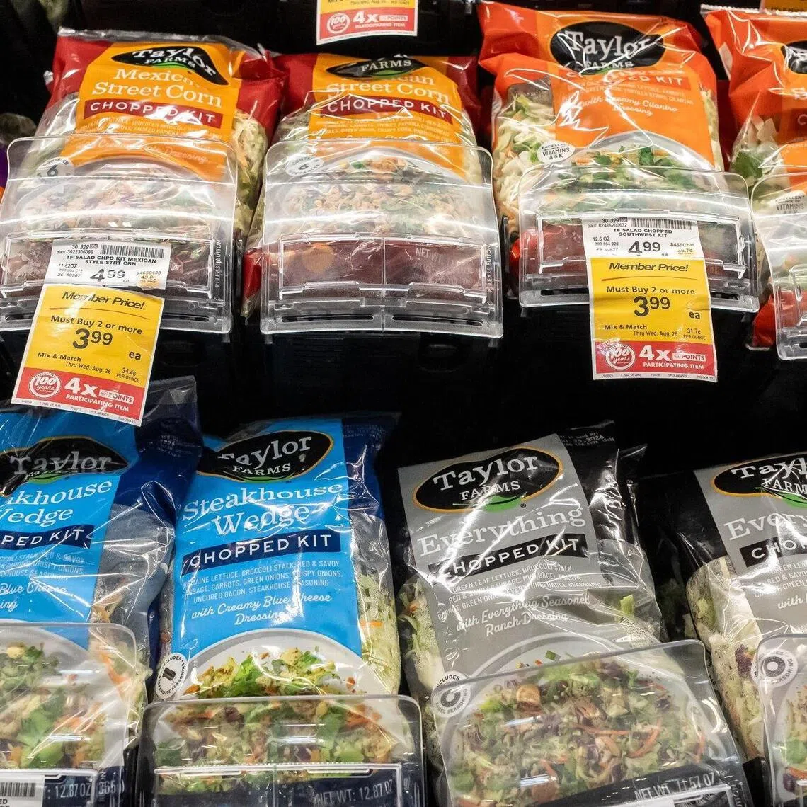 Taylor Farms bagged salad mixes for sale at a grocery store in Hercules, California. The produce supplier has been linked to a major cyclosporiasis outbreak in the US.