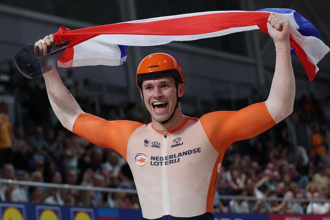 Harrie Lavreysen celebrates winning the men's Elite Sprint Final race during the UCI Cycling World Championships.