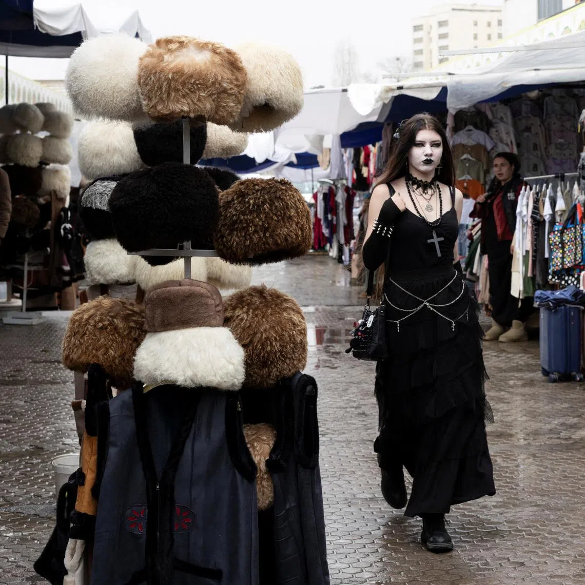 People walk through an open bazaar in Ashgabat, Turkmenistan, March 17, 2026. REUTERS/Umit Bektas