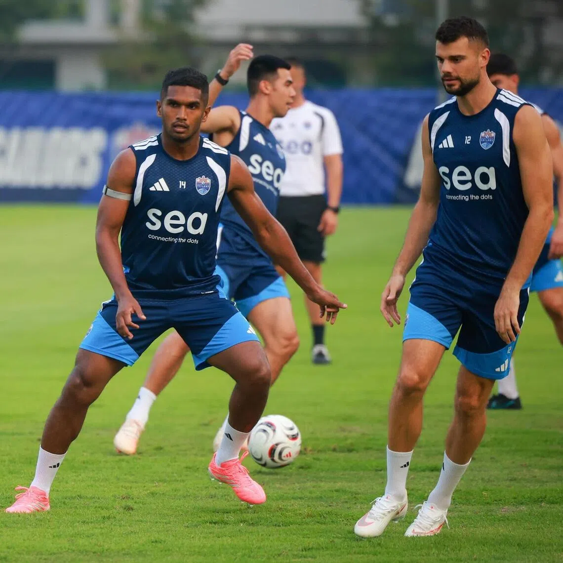 Lion City Sailors captain Hariss Harun (second from right) and new forward signings Antonio Mance (right) and Matthias Phaeton during a training session on Sept 9.
