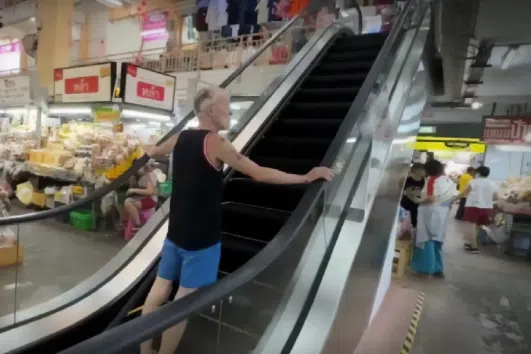 The only escalator in Chiang Mai's Waroros Market is finally working again, after 50 years of being "motionless".