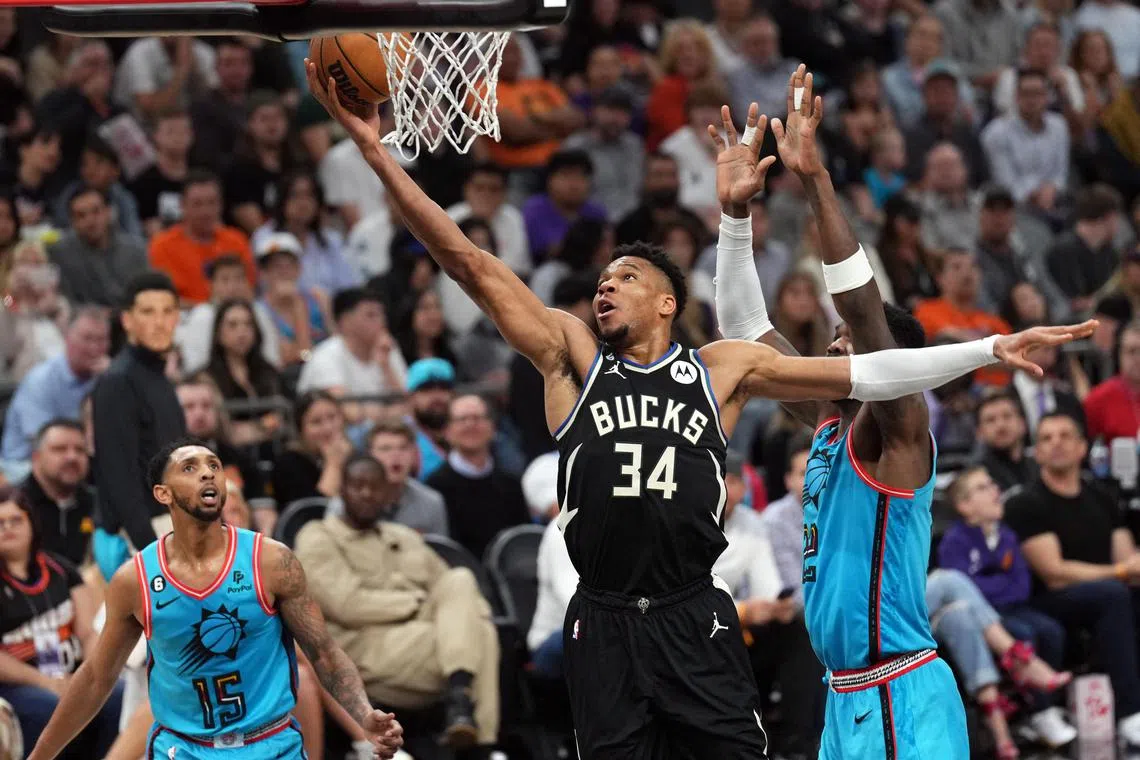 Milwaukee Bucks forward Giannis Antetokounmpo puts up a layup during the 116-104 win over the Phoenix Suns.