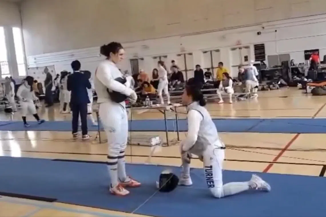 Fencer Stephanie Turner took a knee rather than compete against transgender opponent Redmond Sullivan, in a video that went viral online.