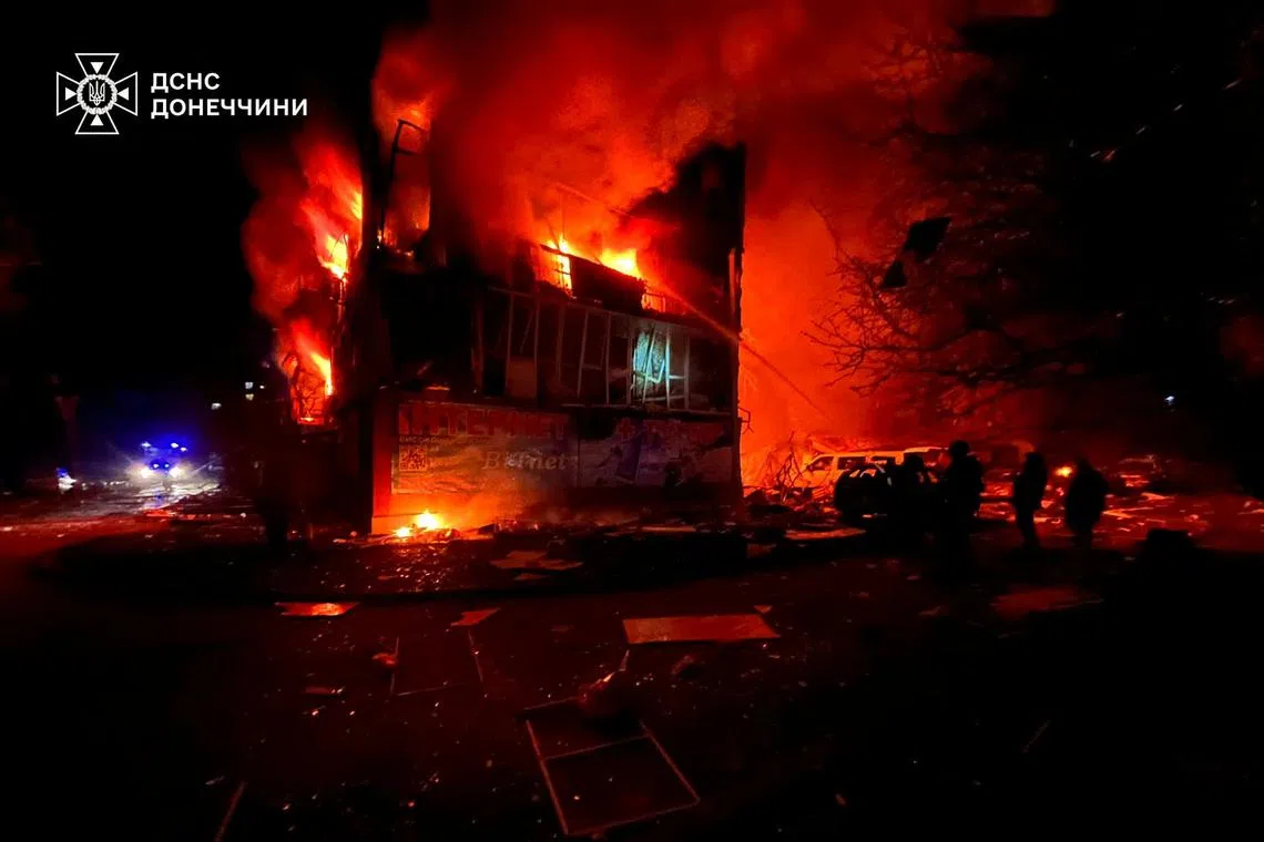 Firefighters work at the site of a residential area hit by a Russian military strike, amid Russia's attack on Ukraine, in the town of Dobropillia, Donetsk region, Ukraine March 8, 2025. Press service of the State Emergency Service of Ukraine in Donetsk region/Handout via REUTERS