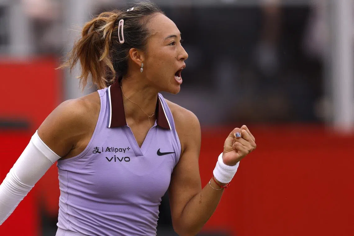 Tennis - Queen's Club Championships - Queen's Club, London, Britain - June 13, 2025 China's Qinwen Zheng celebrates winning her quarter final match against Britain's Emma Raducanu Action Images via Reuters/Andrew Couldridge
