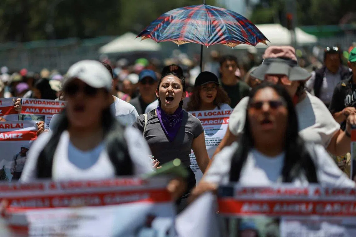 People taking part in a demonstration demanding justice for Ana Ameli Garcia, a 19-year-old woman who went missing on July 12 while hiking in the Cumbres del Ajusco National Park near Mexico City, and others who have disappeared across the country, in Mexico City, Mexico, Aug 3, 2025. 