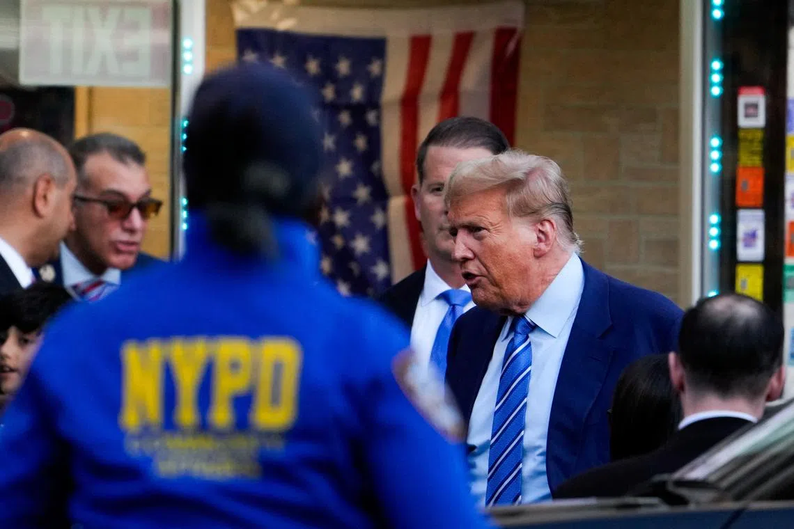FILE PHOTO: Republican presidential candidate and former U.S. President Donald Trump holds a campaign stop at Sanaa convenient store, in the Harlem section of New York City, U.S., April 16, 2024. REUTERS/Adam Gray/File Photo