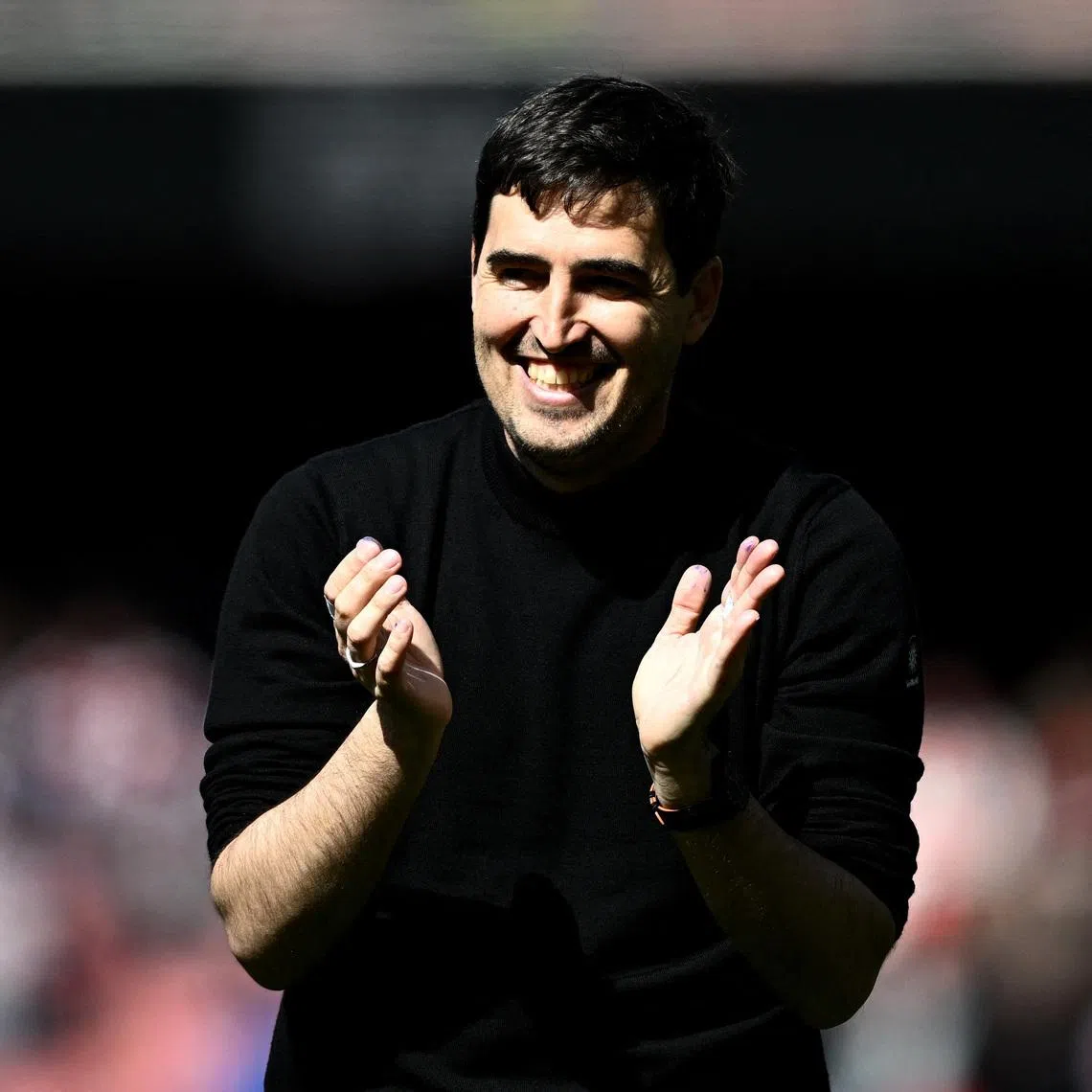 Soccer Football - Premier League - Arsenal v AFC Bournemouth - Emirates Stadium, London, Britain - April 11, 2026 AFC Bournemouth manager Andoni Iraola applauds fans after the match REUTERS/Dylan Martinez