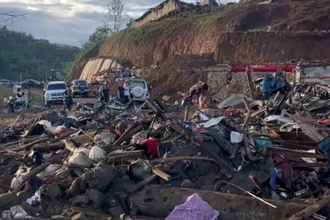Debris in a refugee camp after women and children were killed is seen in this video screengrab obtained from social media, in Laiza, Myanmar, October 10, 2023. Video obtained by Reuters/via REUTERS