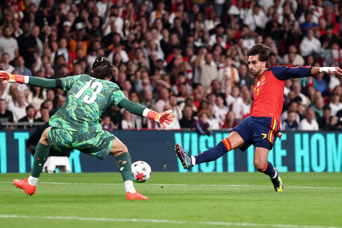 Soccer Football - Nations League - Group A3 - England v Spain - Wembley Stadium, London, Britain - September 26, 2026 England's James Trafford saves the shot from Spain's Ferran Torres REUTERS/David Klein