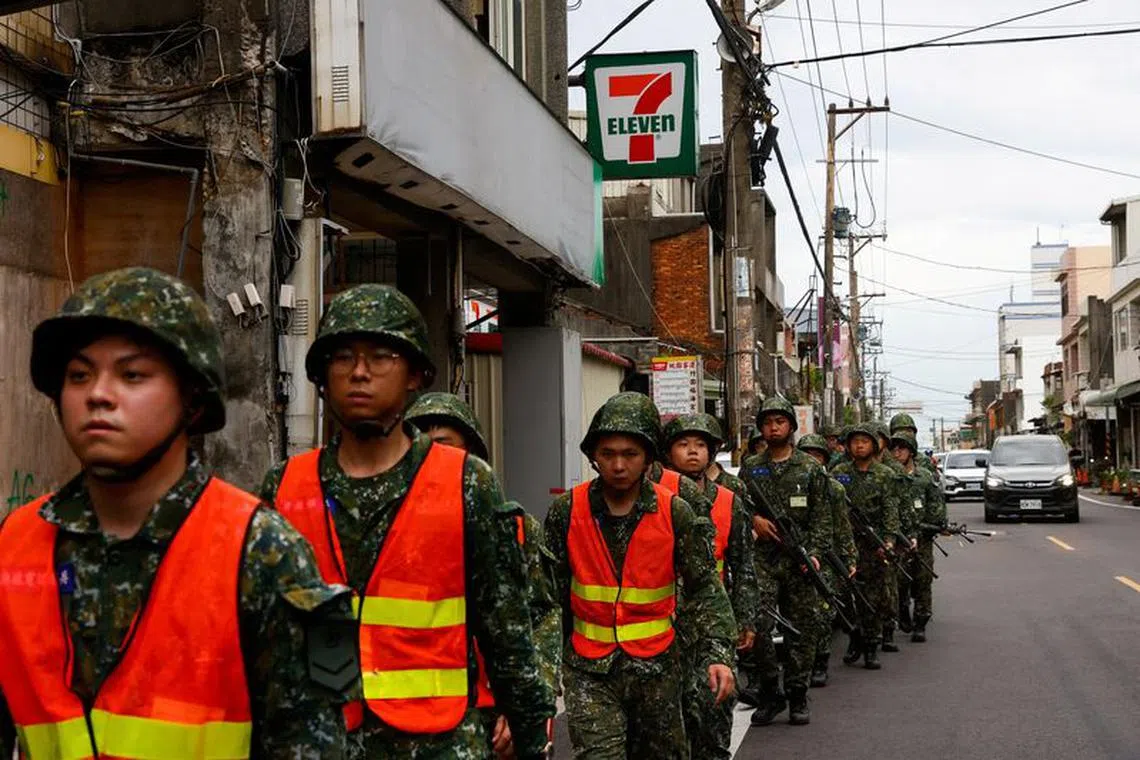 Soldiers march during the annual military drill in Taoyuan, Taiwan July 26, 2023. REUTERS/Ann Wang/File Photo