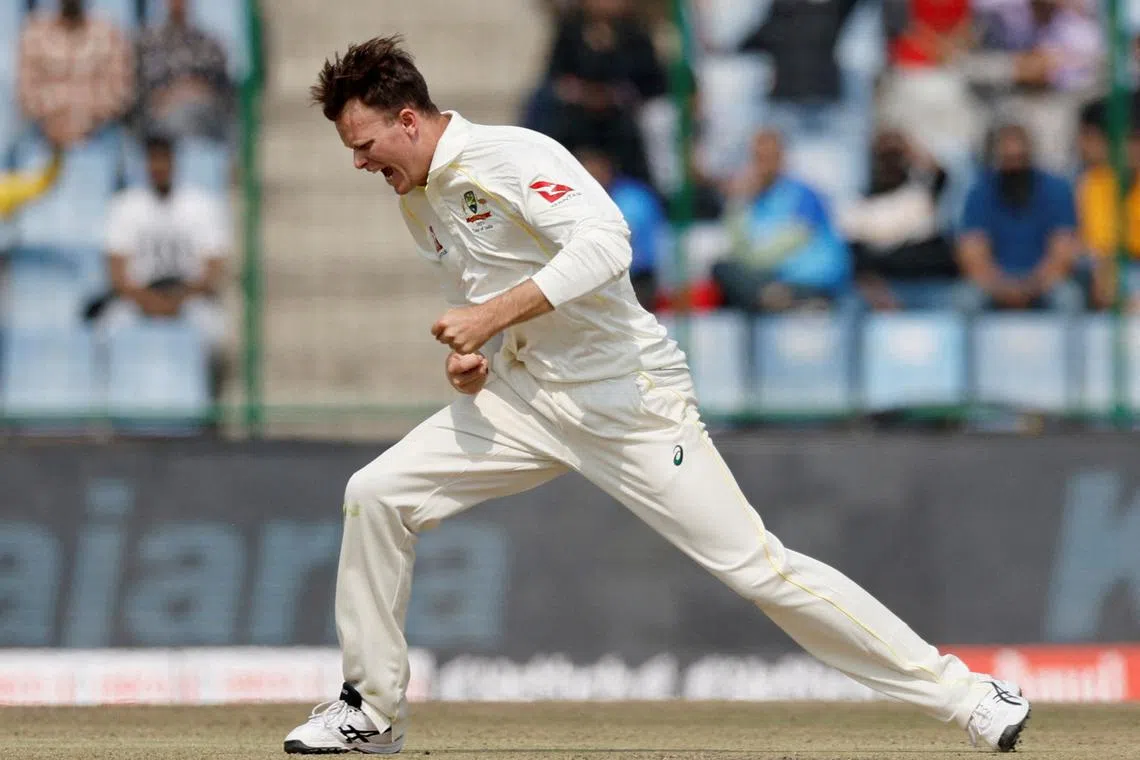 FILE PHOTO: Australia's Matthew Kuhnemann celebrates after taking a wicket in a test in 2023. REUTERS/Adnan Abidi/File Photo