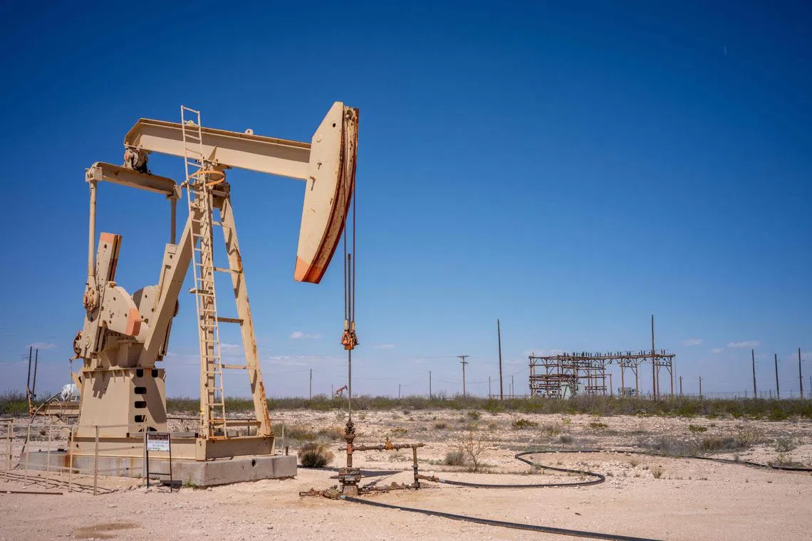GRANDFALLS, TEXAS - MARCH 24: An oil pumpjack in a field on March 24, 2024 in Grandfalls, Texas. Employment in Texas has reached record highs, with the oil- and gas-producing Permian Basin, which covers a large swathe of west Texas, leading the way. Permian Basin towns of Midland and Odessa notched 2.6 and 3.5 percent unemployment respectively, according to the report touted earlier this month by Gov. Gregg Abbott.   Brandon Bell/Getty Images/AFP (Photo by Brandon Bell / GETTY IMAGES NORTH AMERICA / Getty Images via AFP)