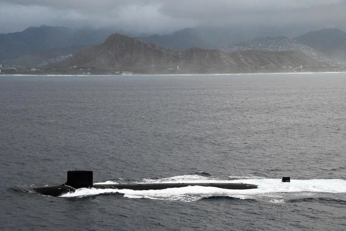 FILE PHOTO: Virginia-class attack submarine USS Hawaii (SSN 776) passes by Diamond Head crater on Oahu in Hawaii while transiting to Pearl Harbor in this July 23, 2009 handout photo obtained by Reuters July 6, 2017.     Mass Communication Specialist 2nd class Meagan Klein/U.S. Navy Photo/Handout via REUTERS    ATTENTION EDITORS - THIS IMAGE WAS PROVIDED BY A THIRD PARTY. EDITORIAL USE ONLY/File Photo