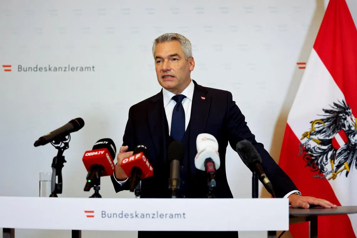 FILE PHOTO: Austrian Chancellor Karl Nehammer holds a press conference on Russia stopping gas deliveries to Austria, in Vienna, Austria, November 15, 2024. REUTERS/Lisa Leutner/ File Photo