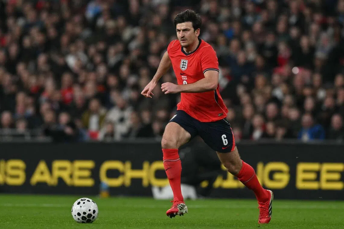 England defender Harry Maguire running with the ball during the 1-1 friendly draw with Uruguay at Wembley Stadium in west London on March 27, 2026.