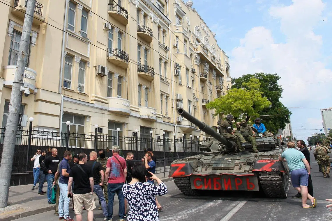 Fighters of the Wagner Group on a tank in the Russian city of Rostov-on-Don on June 24.