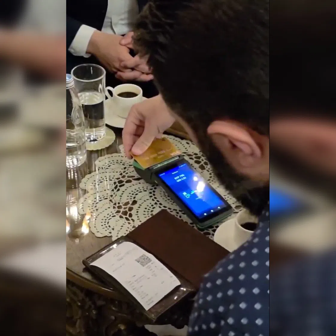 Syrian central bank governor Safwat Raslan posted a video on social media of himself and Syrian President Ahmed al-Sharaa buying coffee at a Damascus cafe by card.