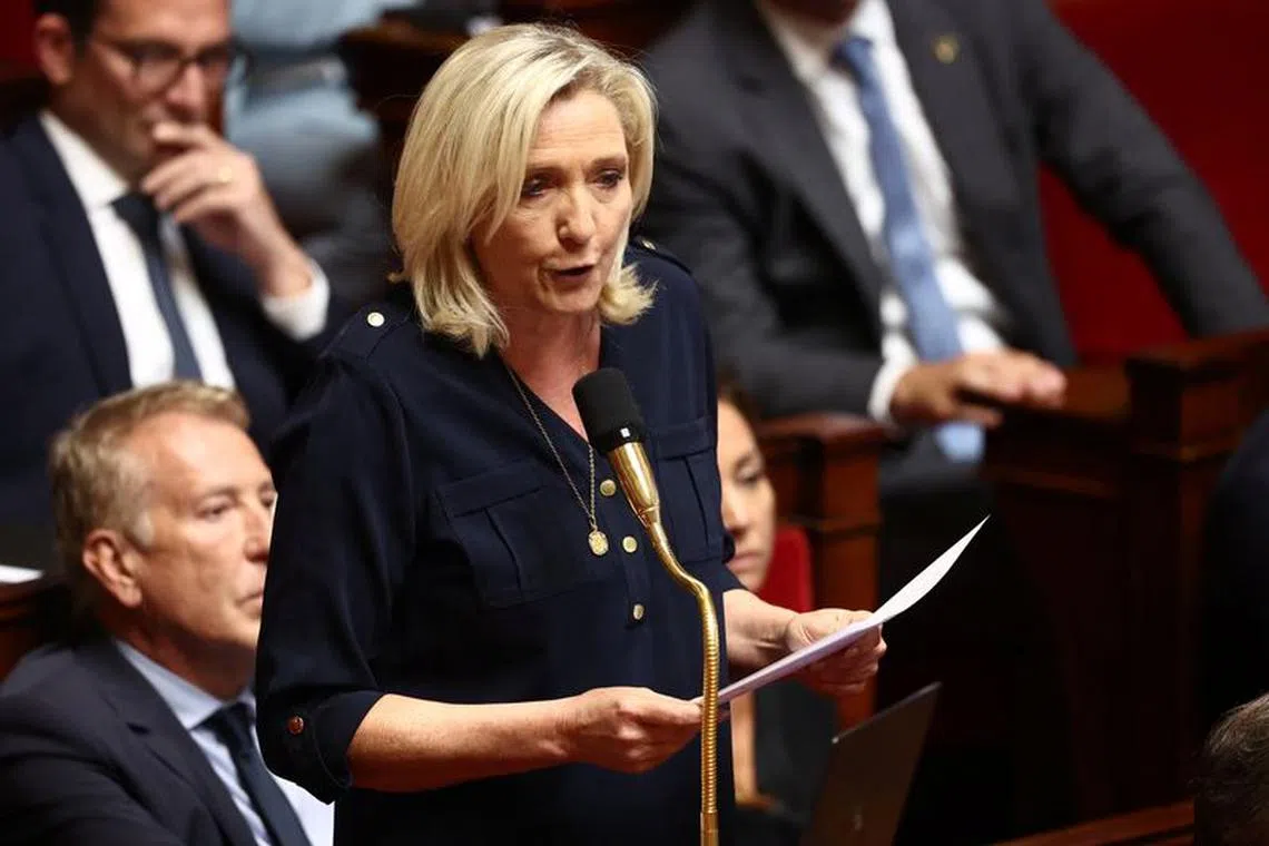 Marine Le Pen, member of parliament and president of the French far-right National Rally (Rassemblement National - RN) party parliamentary group, speaks during the questions to the government session at the National Assembly in Paris, France, July 4, 2023. REUTERS/Stephanie Lecocq/File Photo