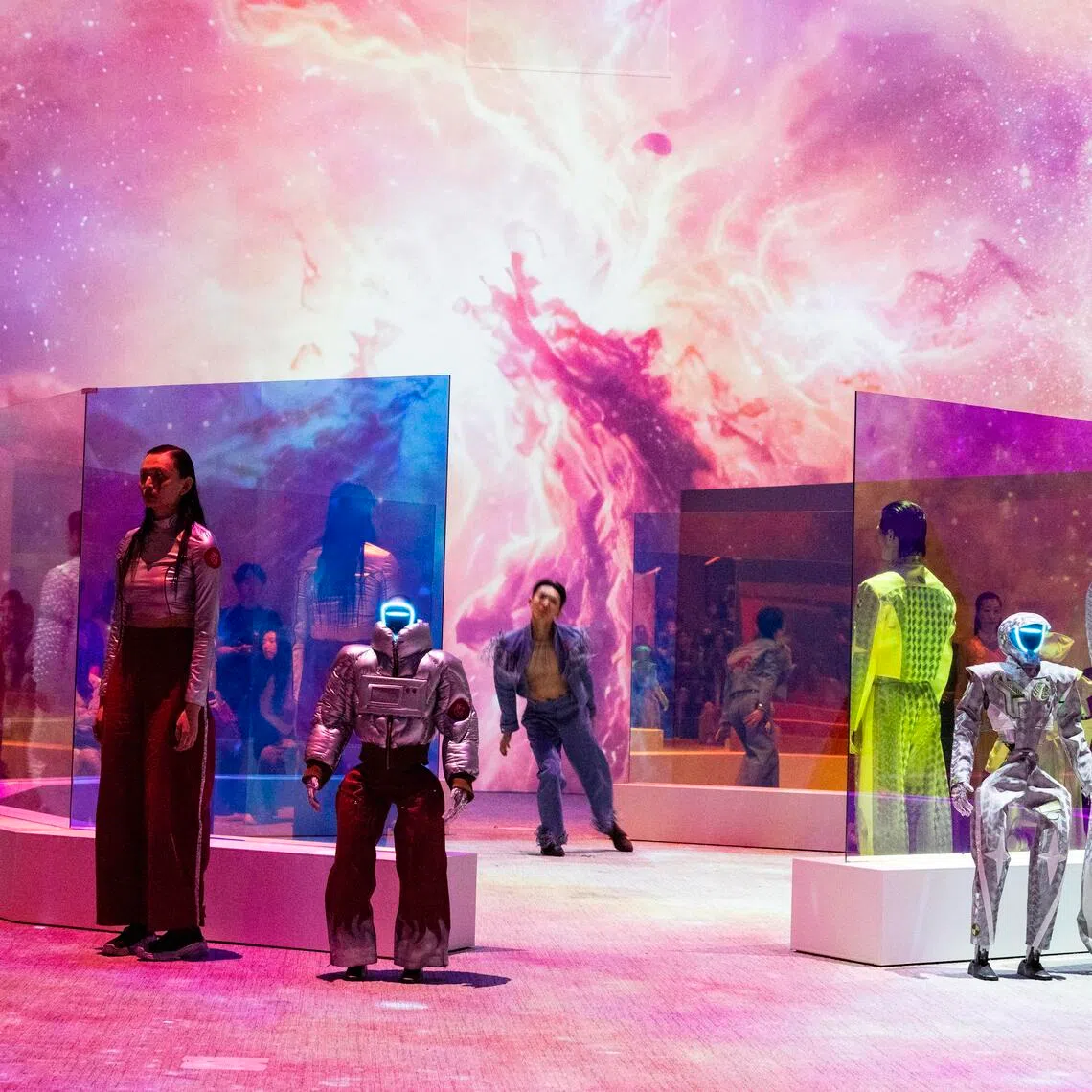 Humanoid robots and models perform as they present creations at Galaxy Corporation's Mach33: Physical AI Fashion Show in Seoul on May 28.