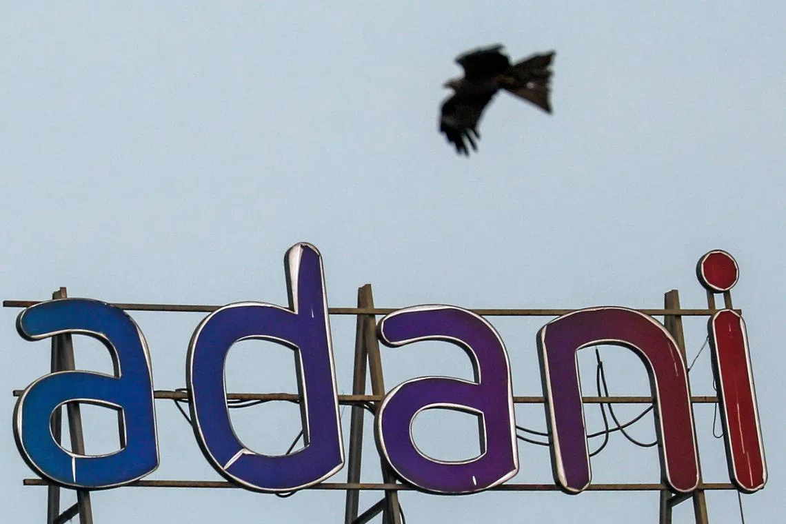 epa10444442 The logo of Adani Group atop a building in Mumbai, India, 02 February 2023. US forensic financial research company Hindenburg Research on 24 January published a report accusing Indian conglomerate Adani Group of stock market manipulation andd fraud, which the Adani Group denies.  EPA-EFE/DIVYAKANT SOLANKI