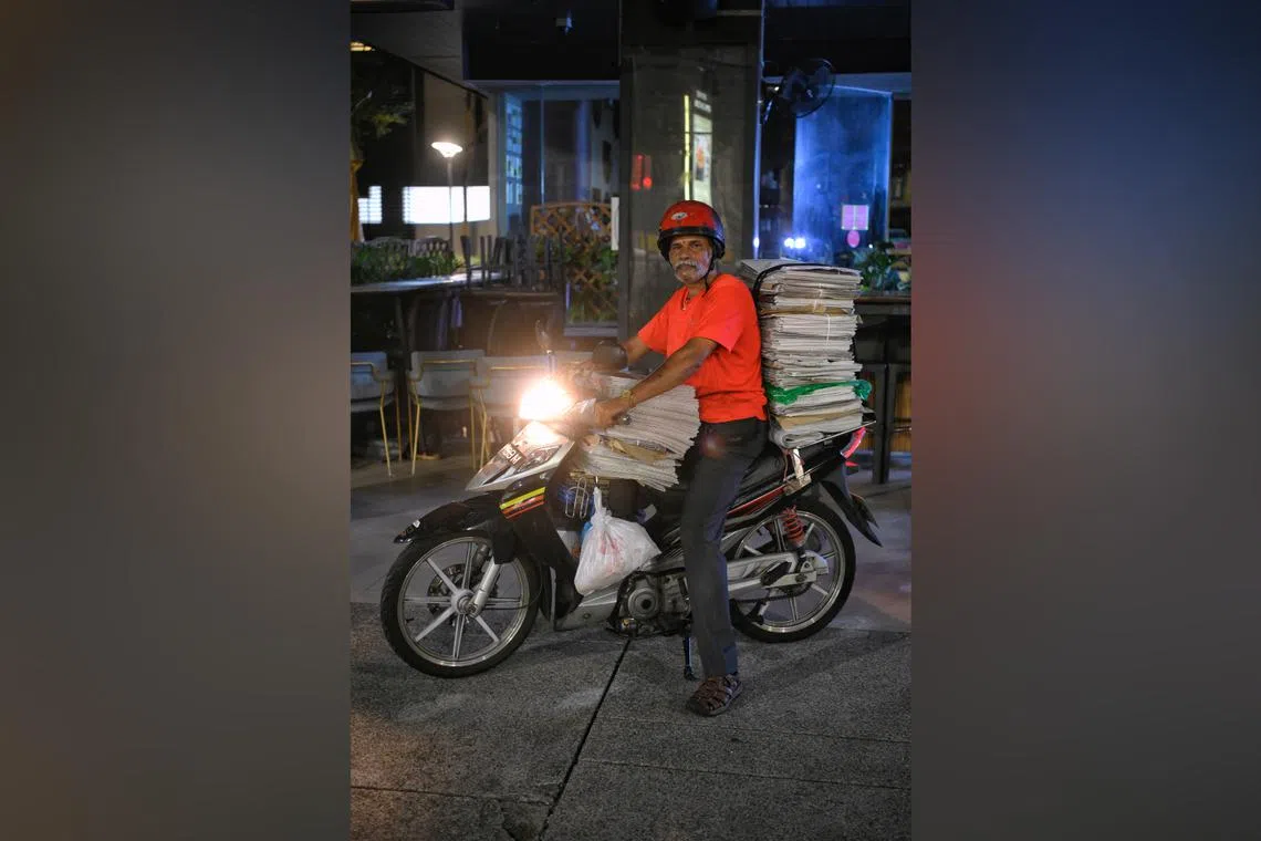 Mr Rathnakumar Chokkalingam delivers SPH Media’s five news broadsheets in the Beach Road area.