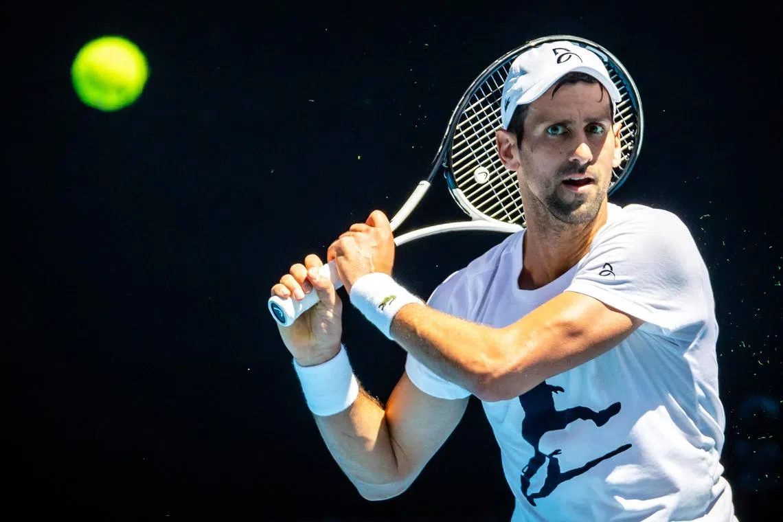 Novak Djokovic attends a practice match with Russian player Daniil Medvedev ahead of the Australian Open in Melbourne, on Jan 11, 2023.