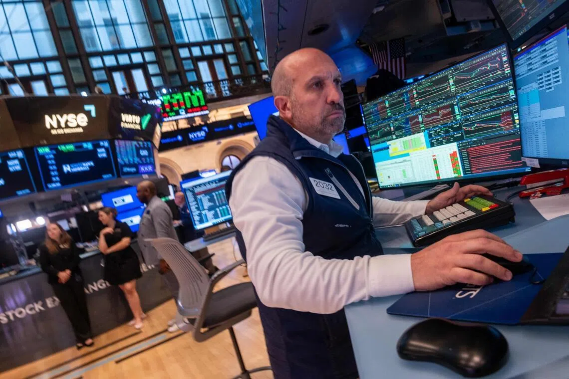 Traders working on the floor of the New York Stock Exchange on June 11, in New York City.