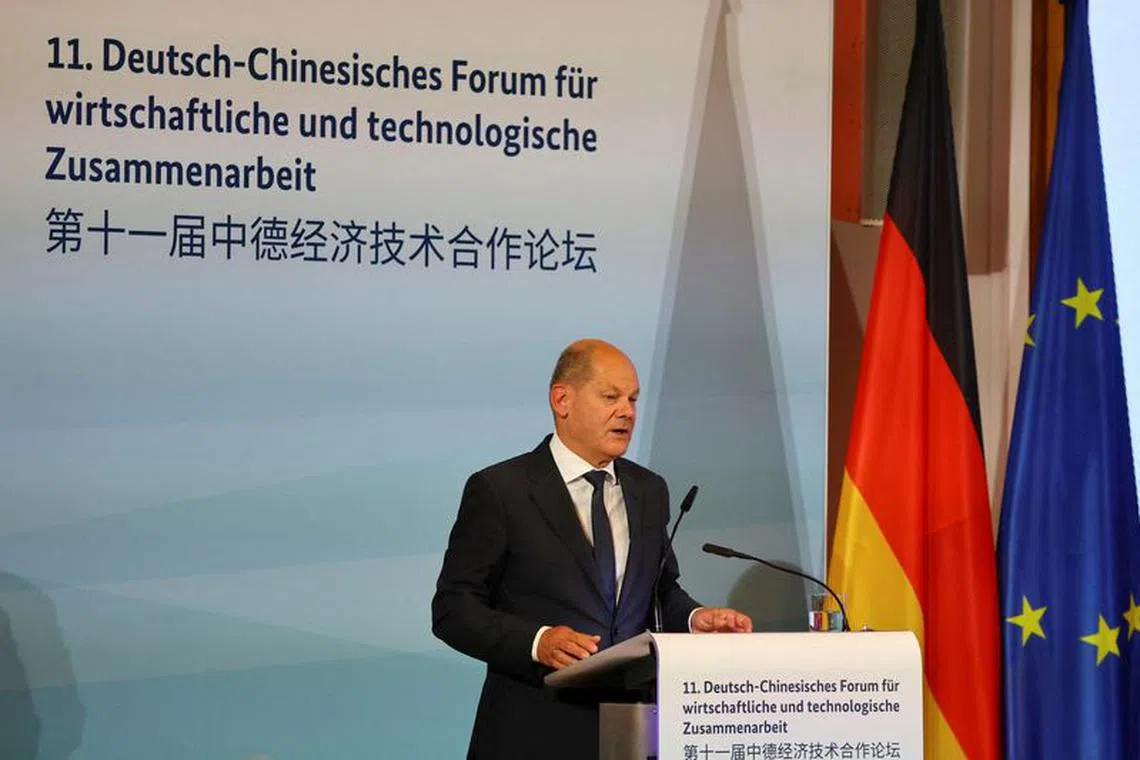 German Chancellor Olaf Scholz speaks at a panel during German-Chinese government consultations in Berlin, Germany, June 20, 2023. REUTERS/Fabrizio Bensch/File Photo