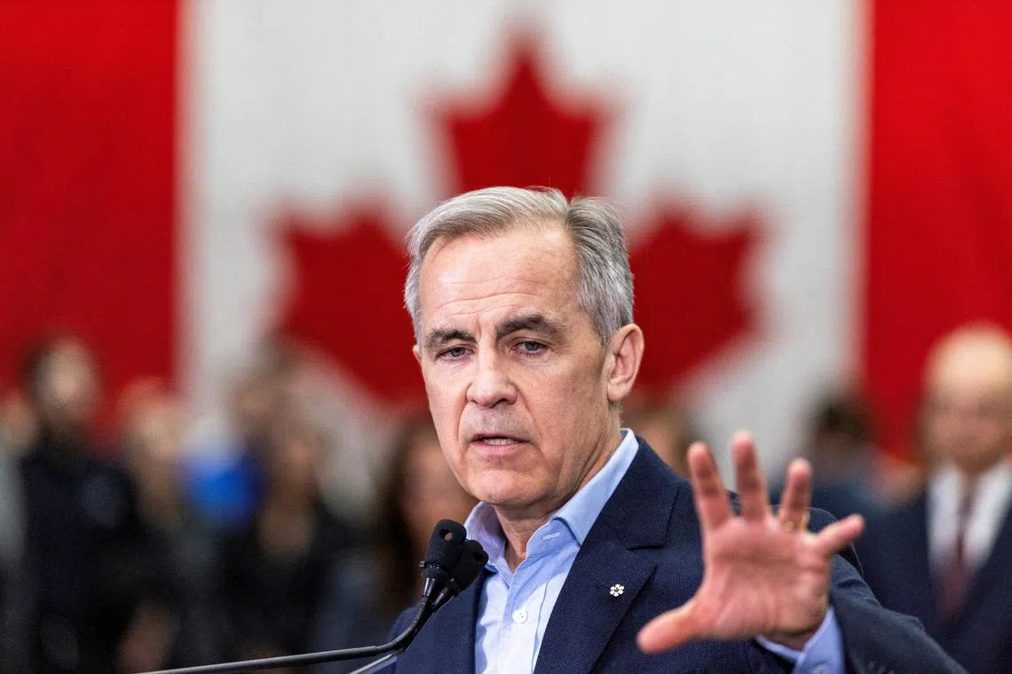 FILE PHOTO: Canada's Prime Minister Mark Carney delivers remarks at Marmen Inc., a steel fabrication and machining company, during his Liberal Party election campaign tour in Trois-Rivieres, Quebec Canada April 22, 2025. REUTERS/Carlos Osorio/File Photo