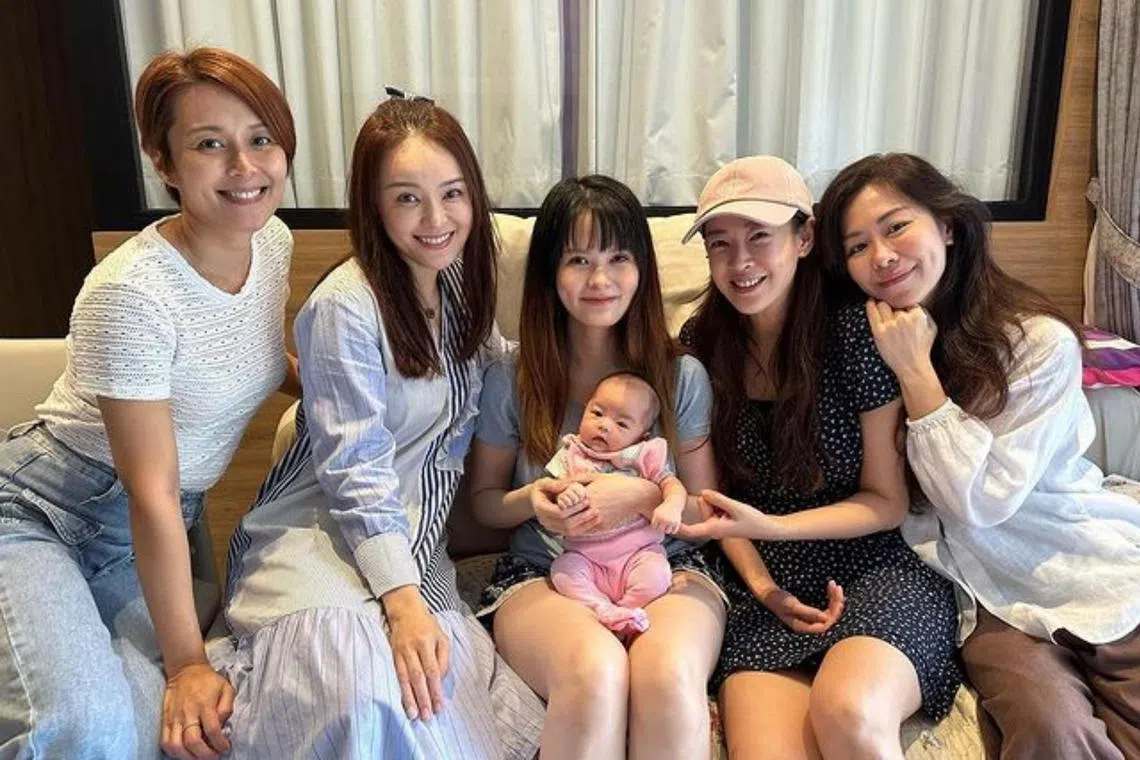 (From left) Priscelia Chan, Apple Hong, Jayley Woo (with her baby), Jesseca Liu and Michelle Chia have reunited once more.