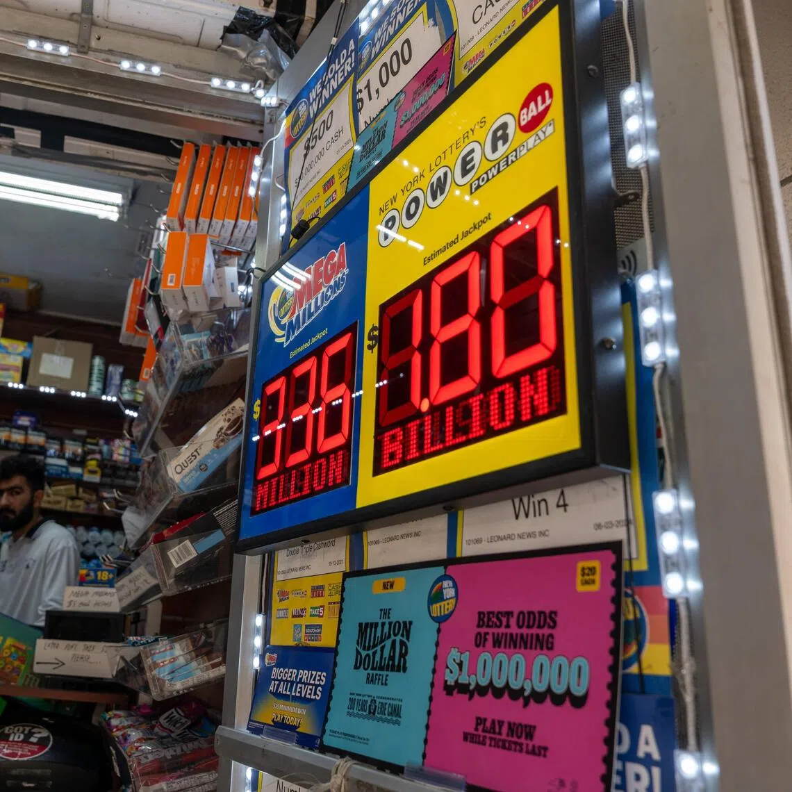 NEW YORK CITY - SEPTEMBER 05: A newsstand in Manhattan advertises the latest Powerball Jackpot, now reaching $1.8 billion, on September 05, 2025, in New York City. Saturday night's drawing will follow no winners from Wednesday's $1.4 billion grand prize, Powerball said.   Spencer Platt/Getty Images/AFP (Photo by SPENCER PLATT / GETTY IMAGES NORTH AMERICA / Getty Images via AFP)