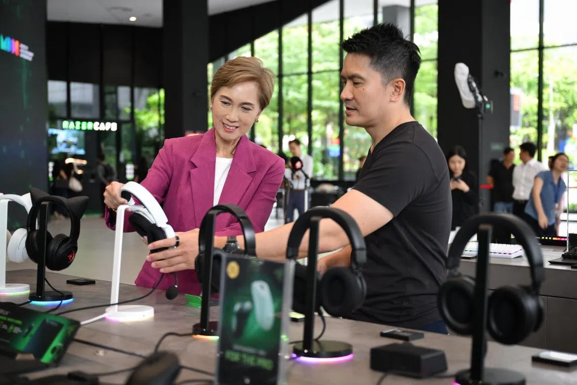 Minister for Digital Development and Information Josephine Teo and Razer chief executive Tan Min-Liang at the opening of Razer’s AI Centre of Excellence on Aug 4.