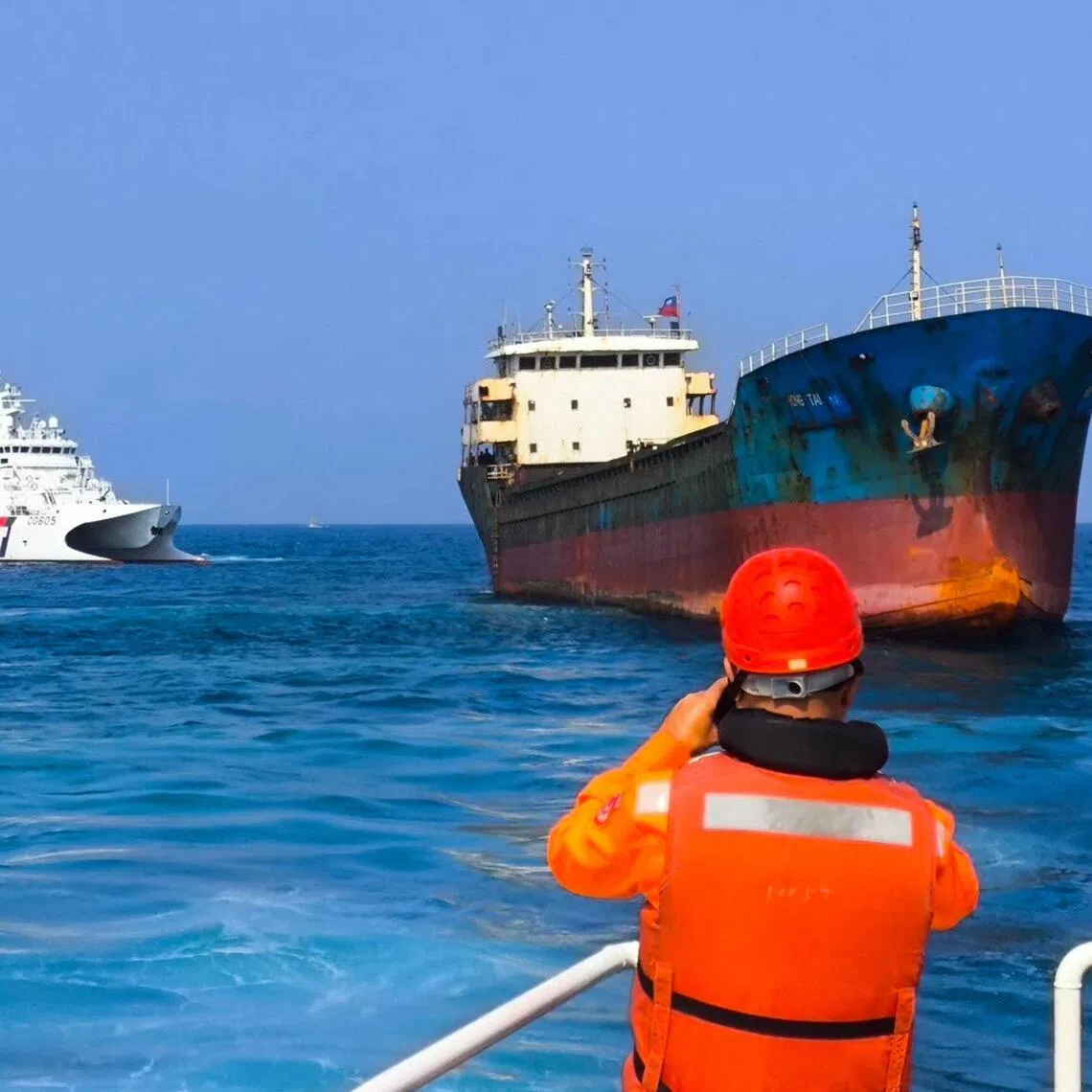 This handout photo taken and released on Feb 25 by the Taiwan Coast Guard shows the detained Togolese-registered ship "Hongtai" in Penghu. Taiwan detained the Chinese-crewed cargo ship after a subsea telecoms cable was severed off the island, the coast guard said. 